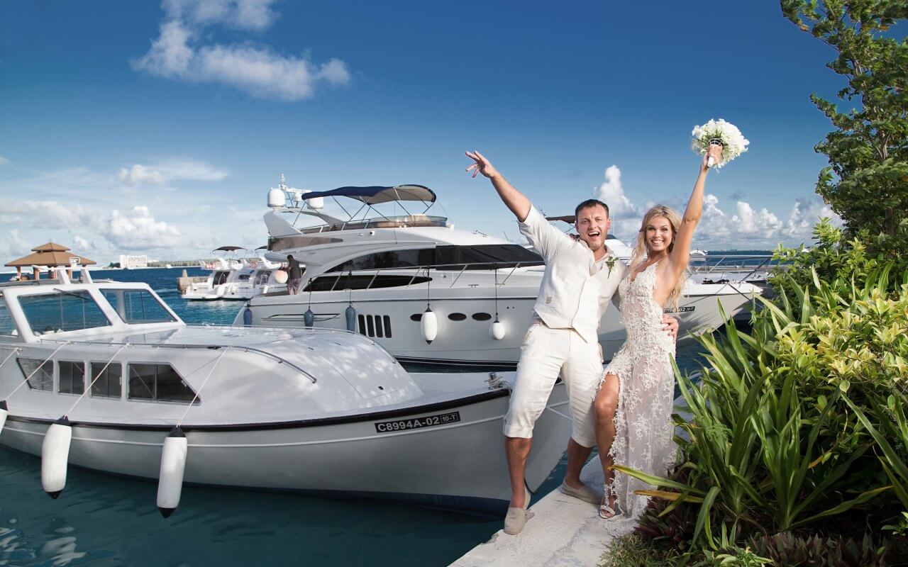 Happy wedding couple new yacht
