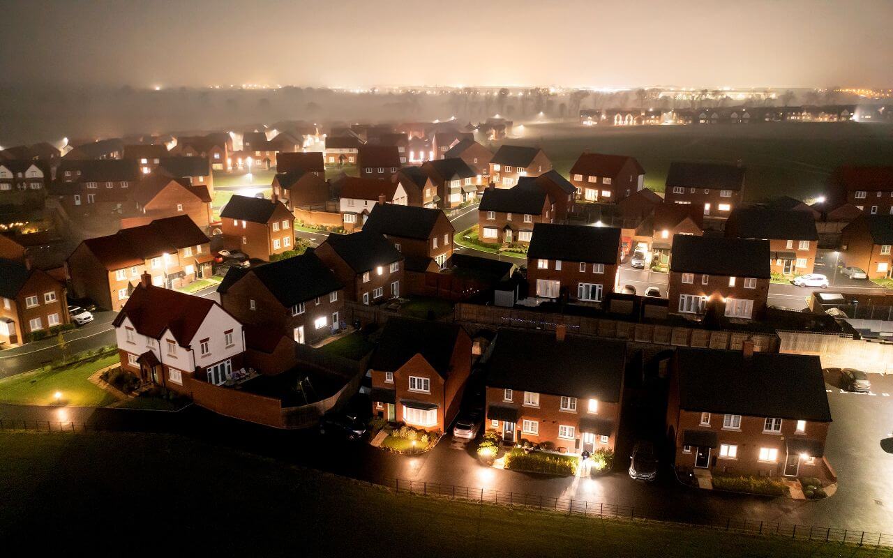 UK Housing development at night foggy